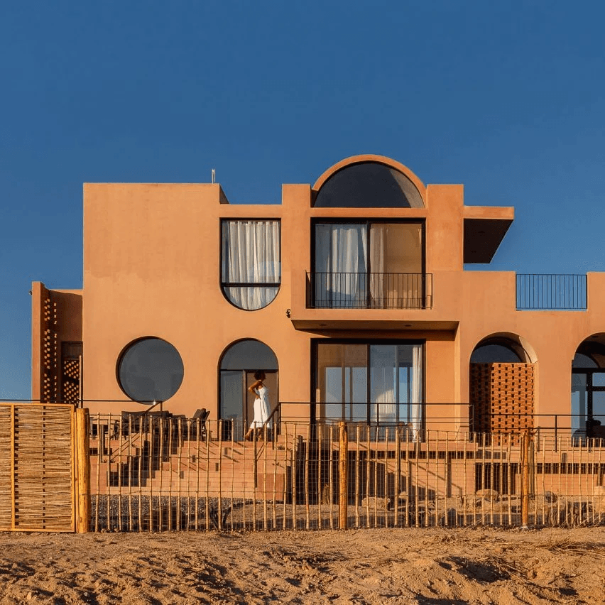 Earth-toned concrete covers Casa Calafia in Mexico by RED Arquitectos