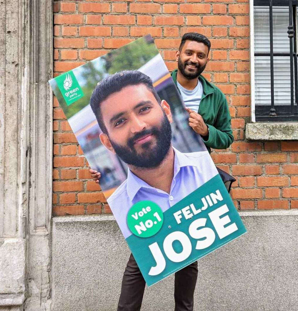 Building Climate-Ready Streets, Homes & Transit with Feljin Jose 29 Feljin Jose holding a campaign poster of himself